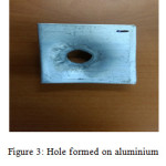 Figure 3: Hole formed on aluminium pate in electric firing test.